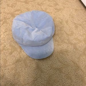 a light blue cap